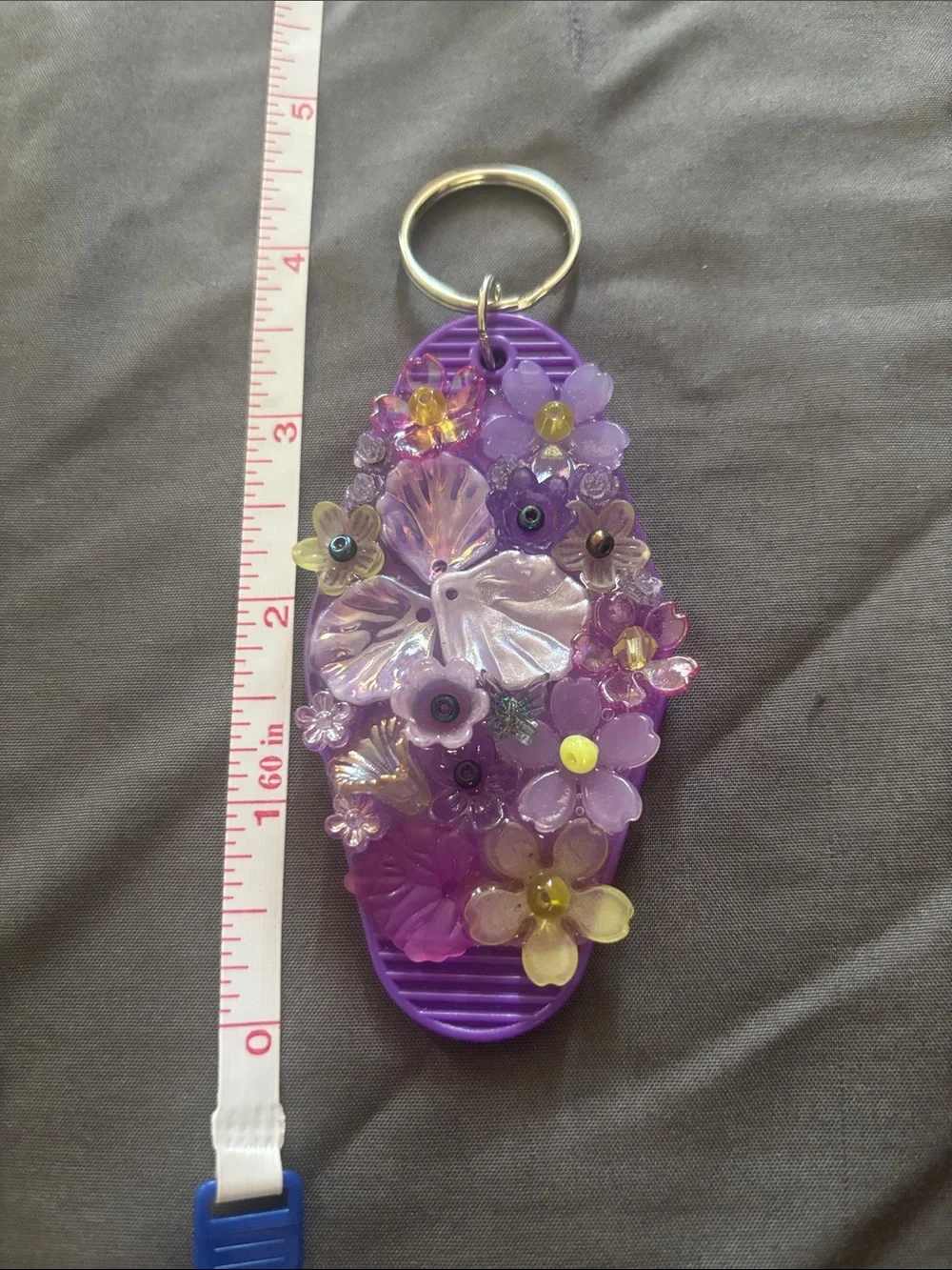 Flower beadazzeled purple motel style keychain